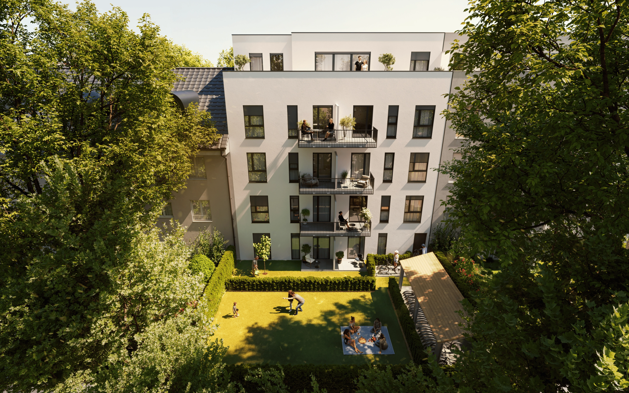 Vorderansicht der Lutteroth Lofts, umgeben von Sträuchern und einem modernen, aber gemütlichen Straßenzug.