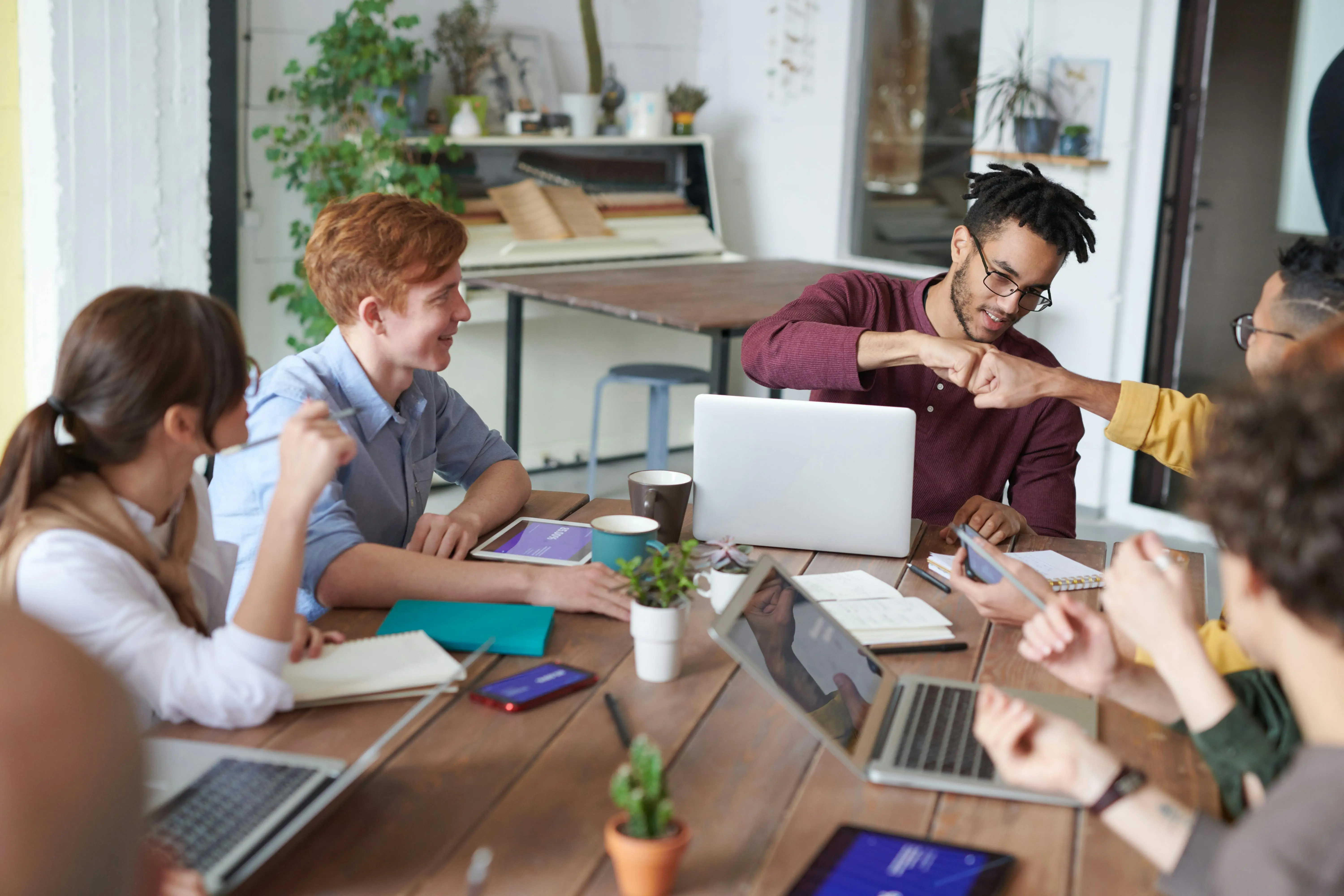 A group of people working at a table