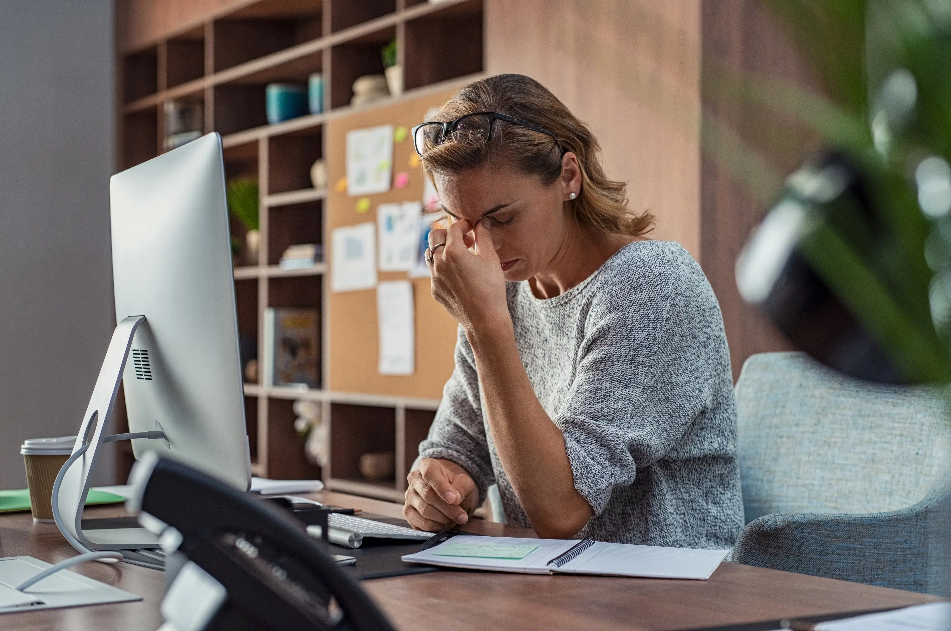 A woman sitting in front of a computer
