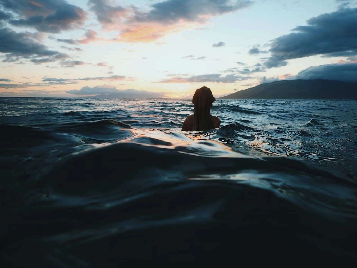 Swimmer looking out to the horizon