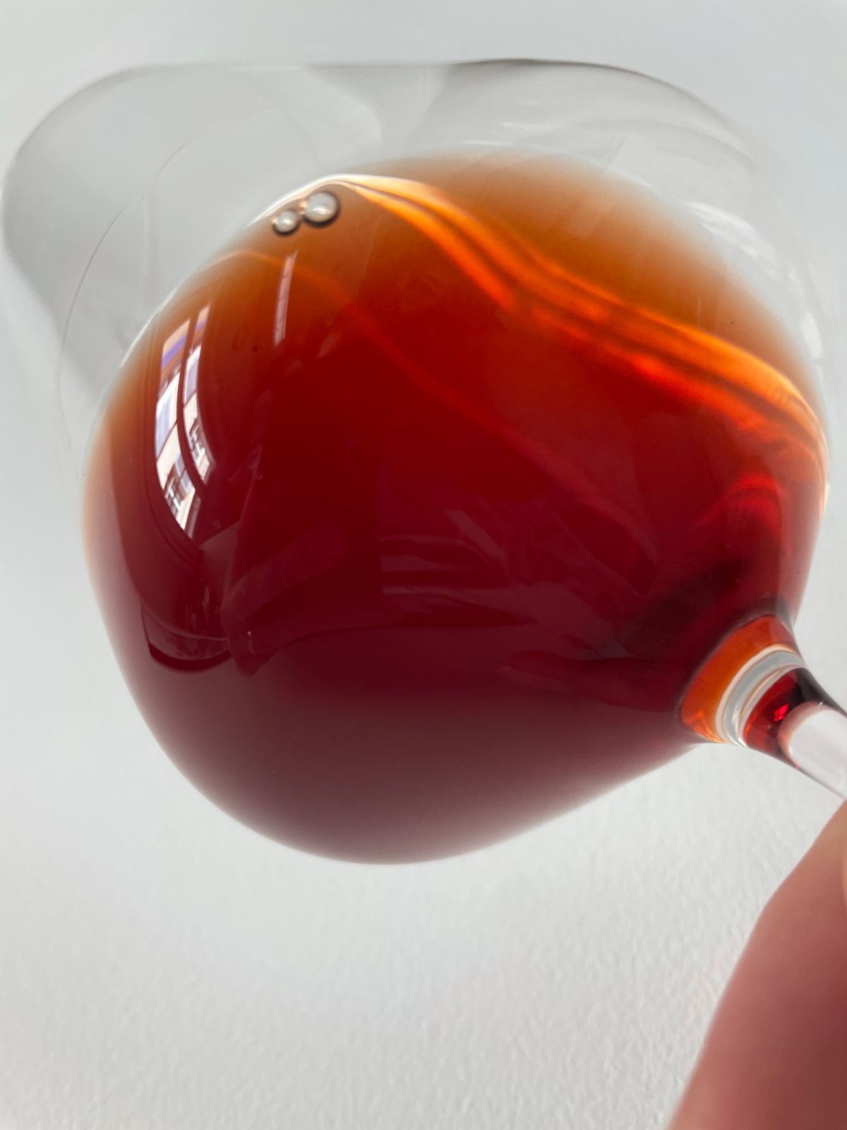 Image a wine glass with red wine, Cote Rotie, produced in 1978