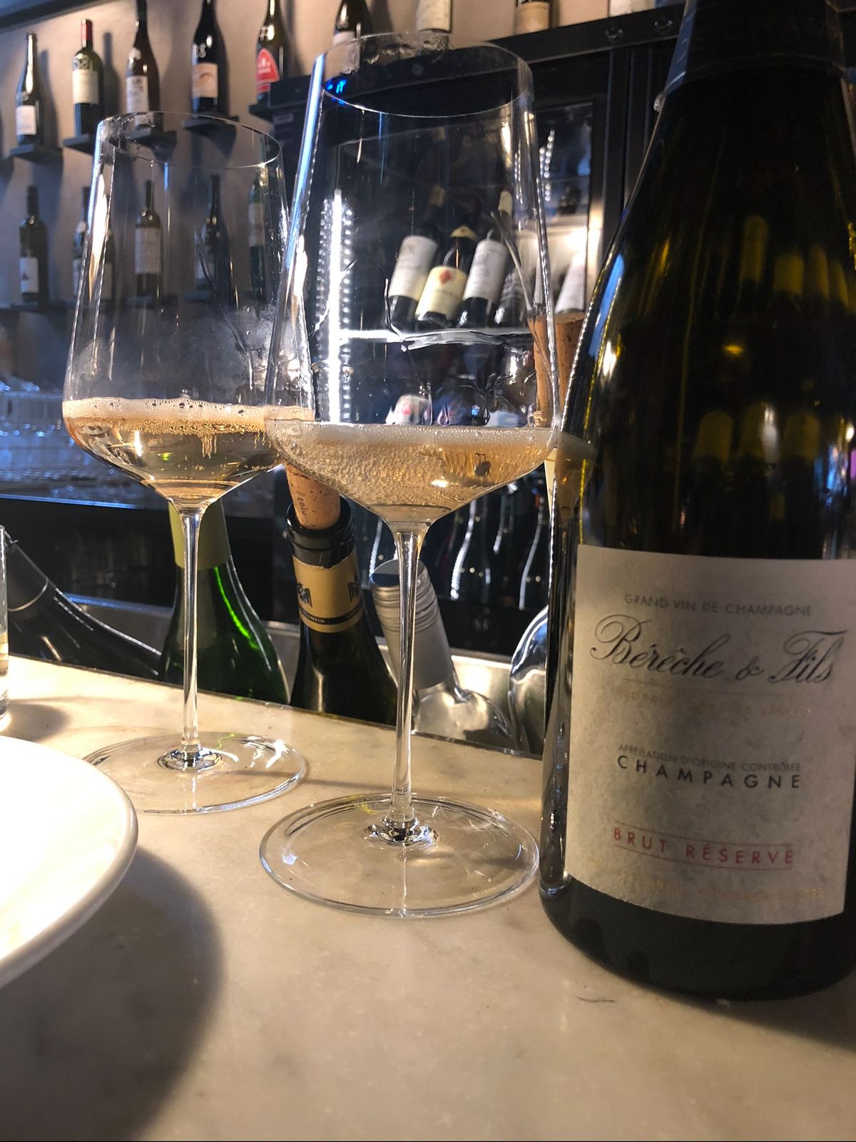 Bottle of Bereche et Fils Brut Reserve and two glasses