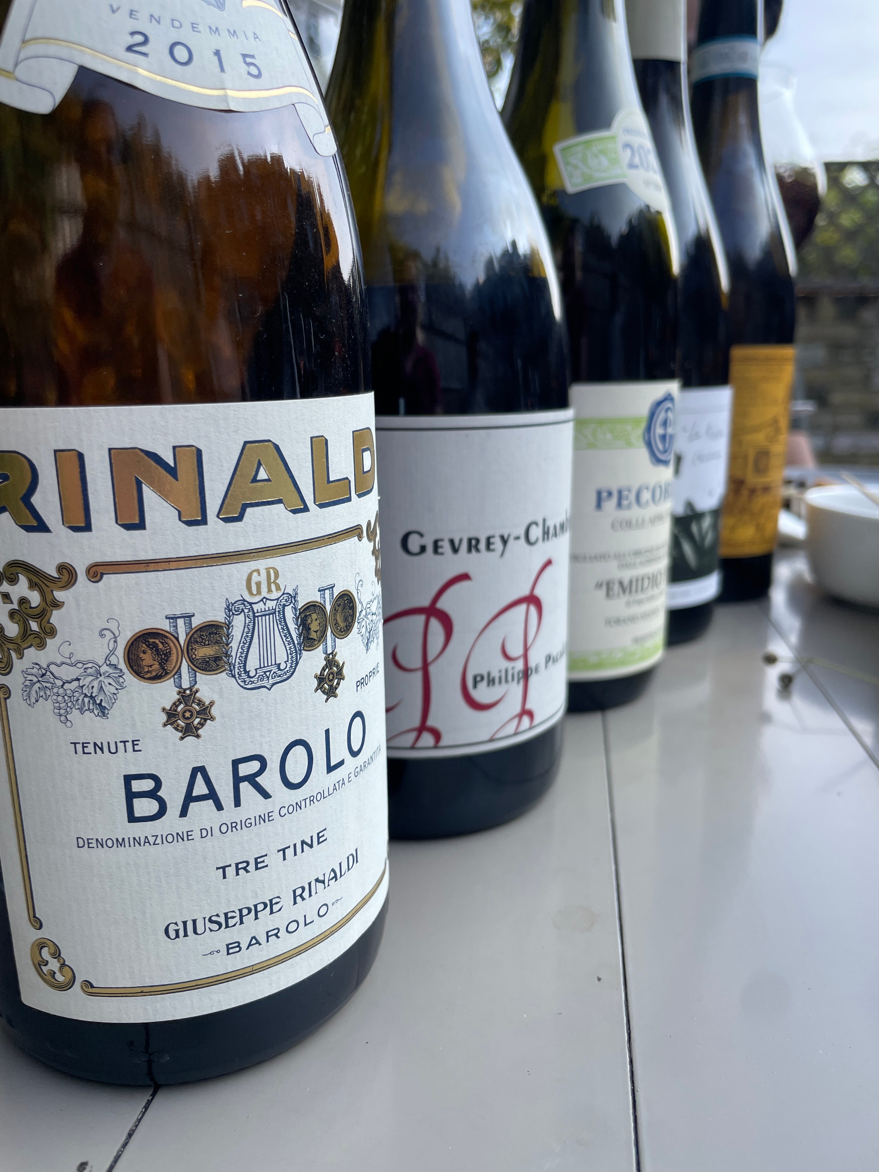 A lineup of five wine bottles from Rinaldi, Pacalet, Pepe, Labet and Valentini