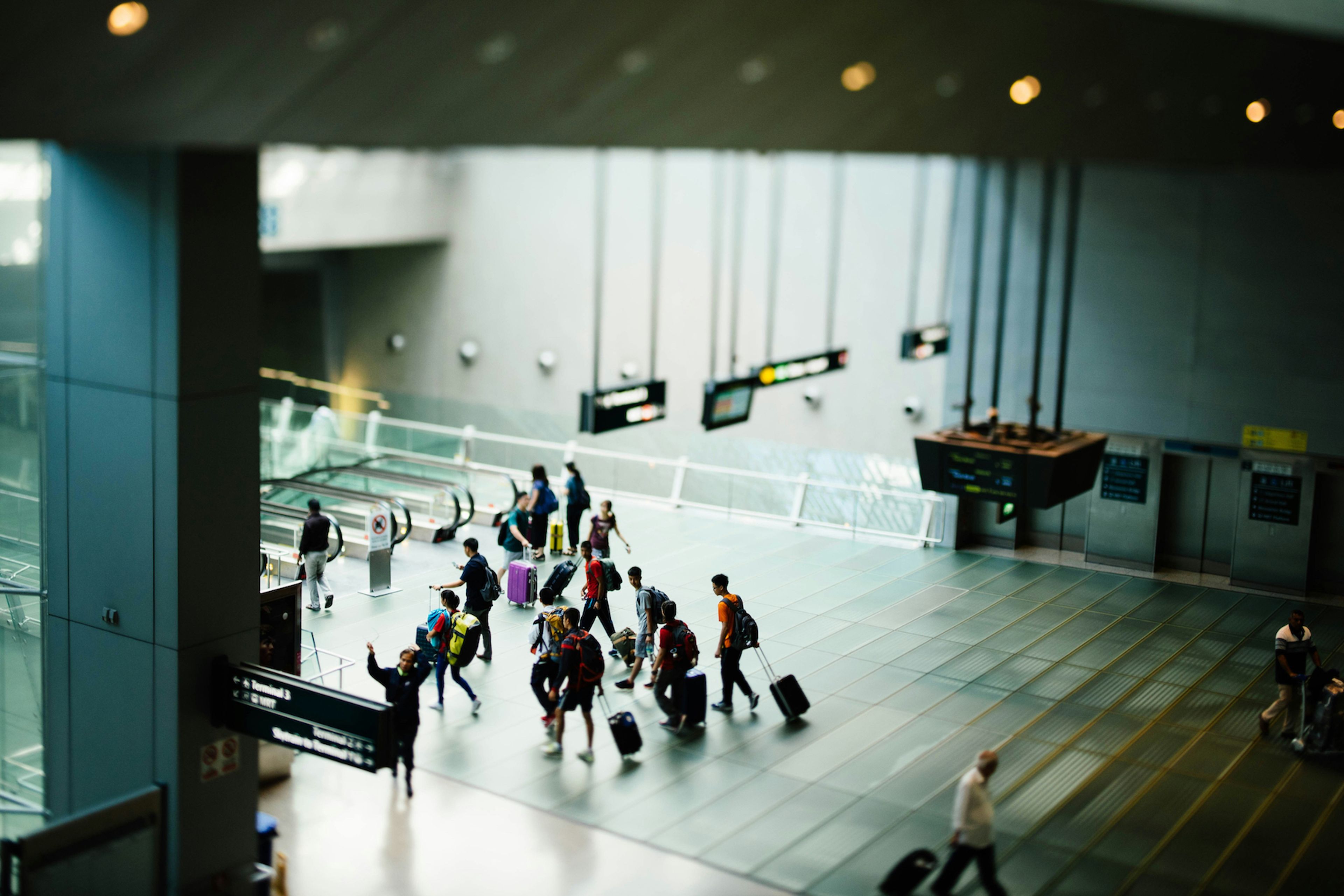 figurines of people in an airport