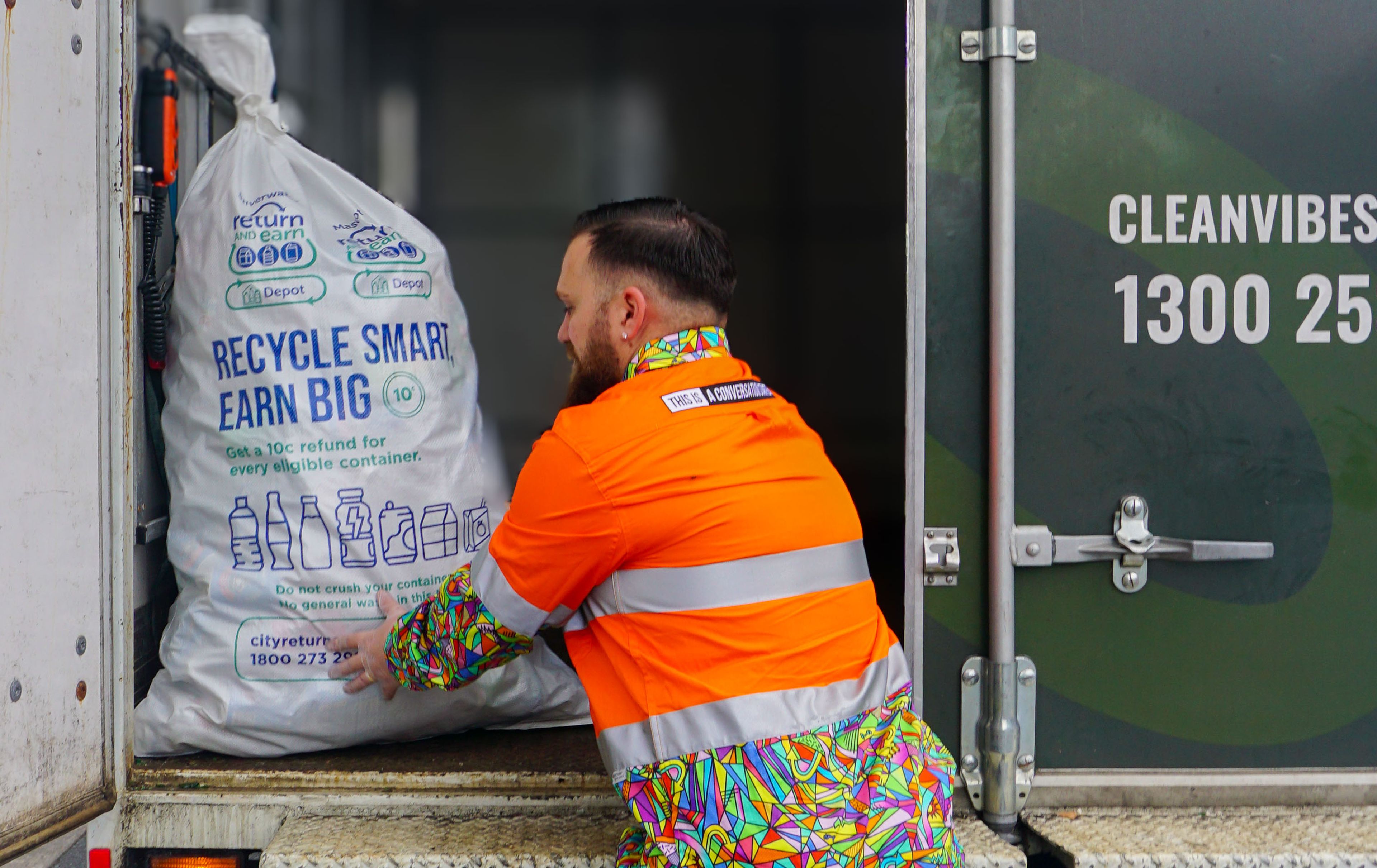 Truck picking up containers