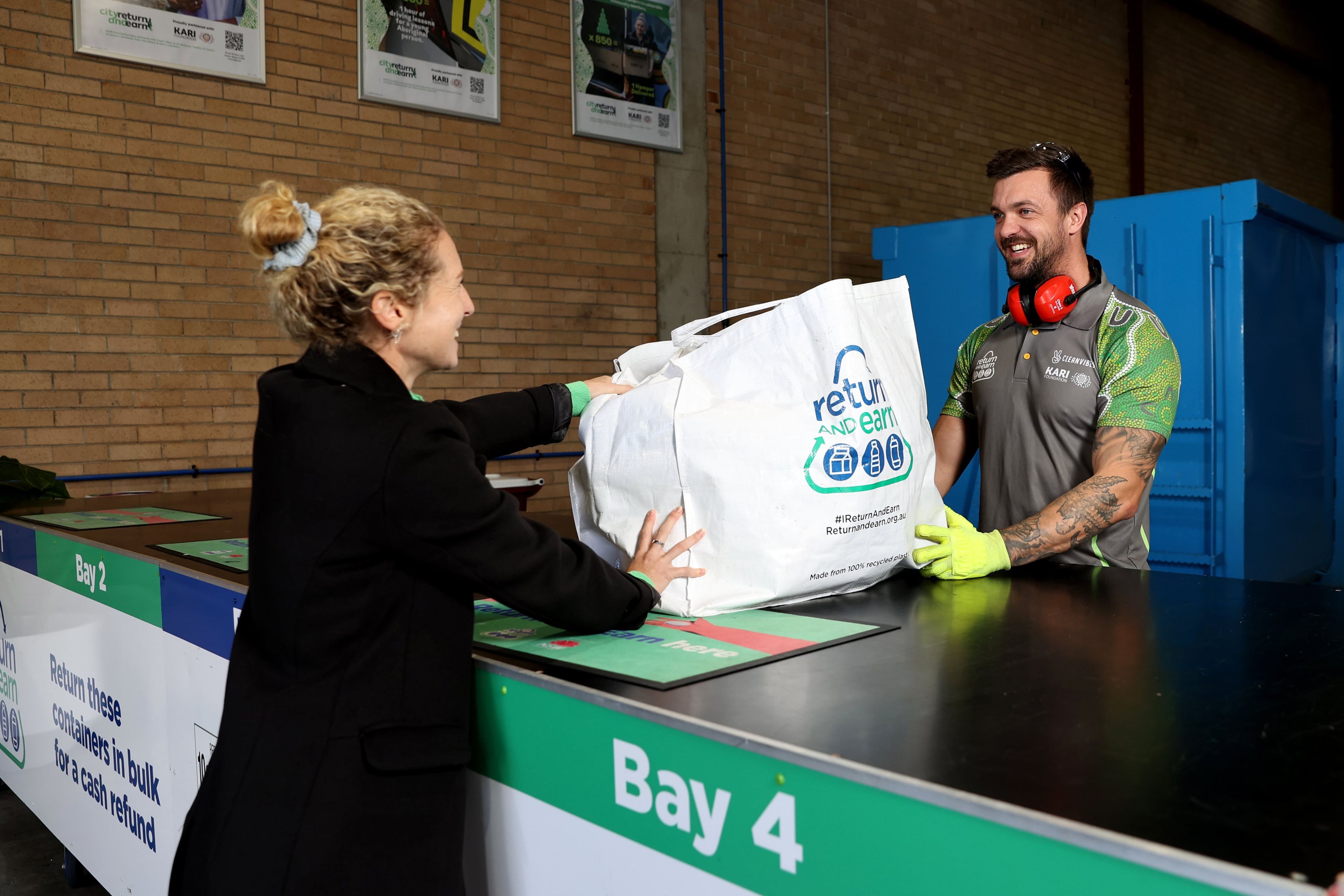 Guy taking return and earn bag