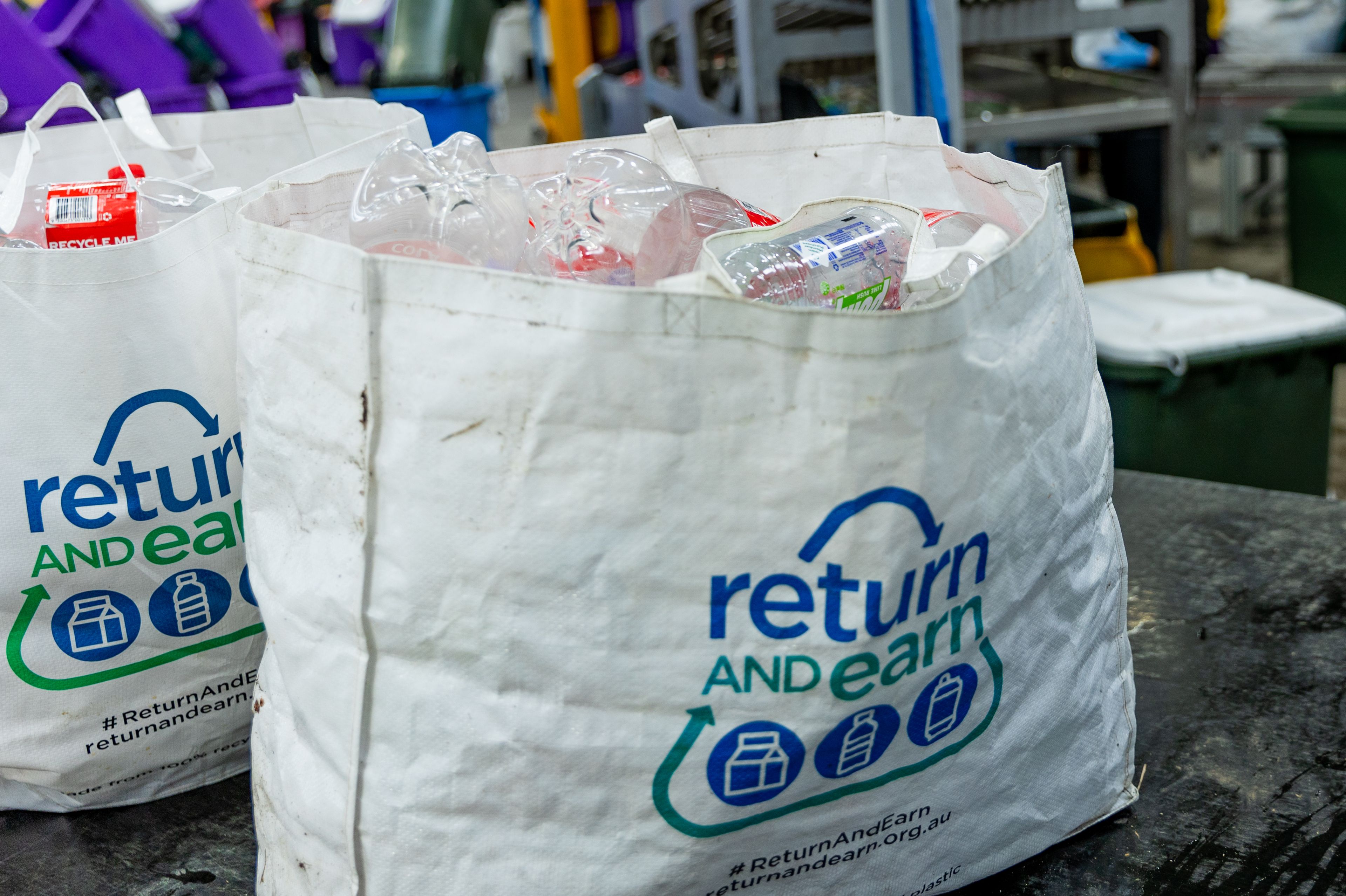 Bottles and containers in Return and Earn bag