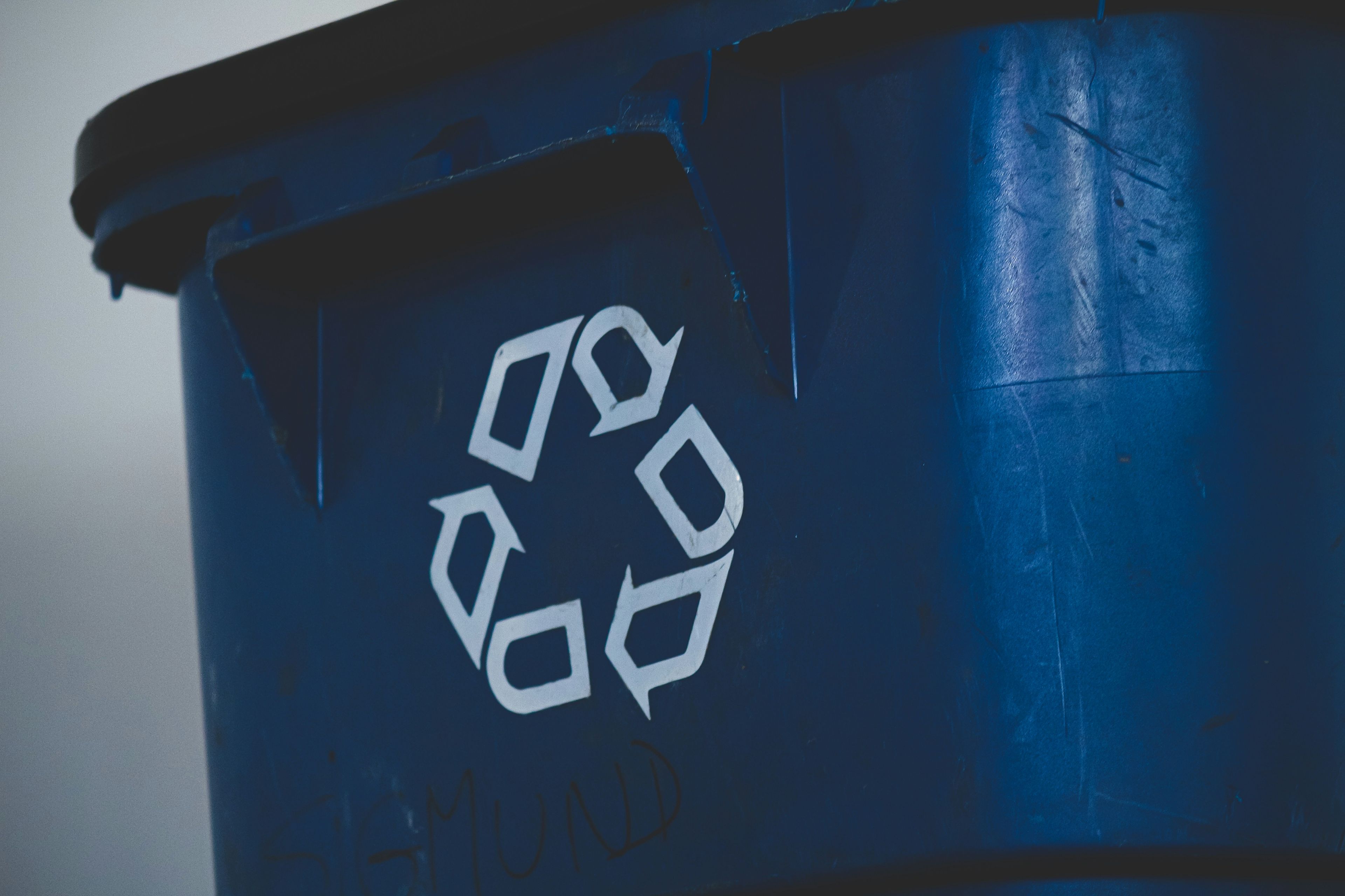 bin with recycling symbol