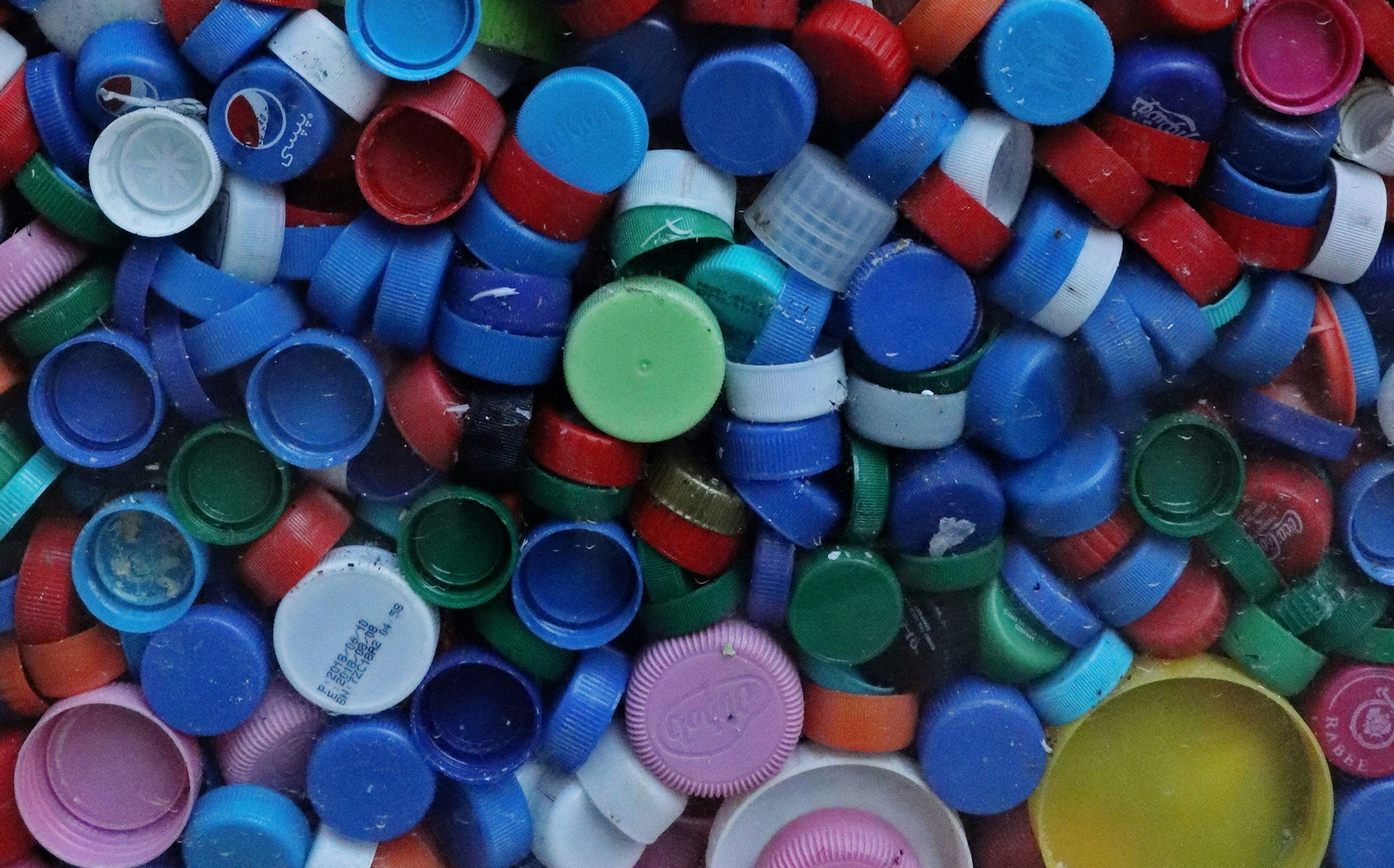 A collection of colorful bottle lids