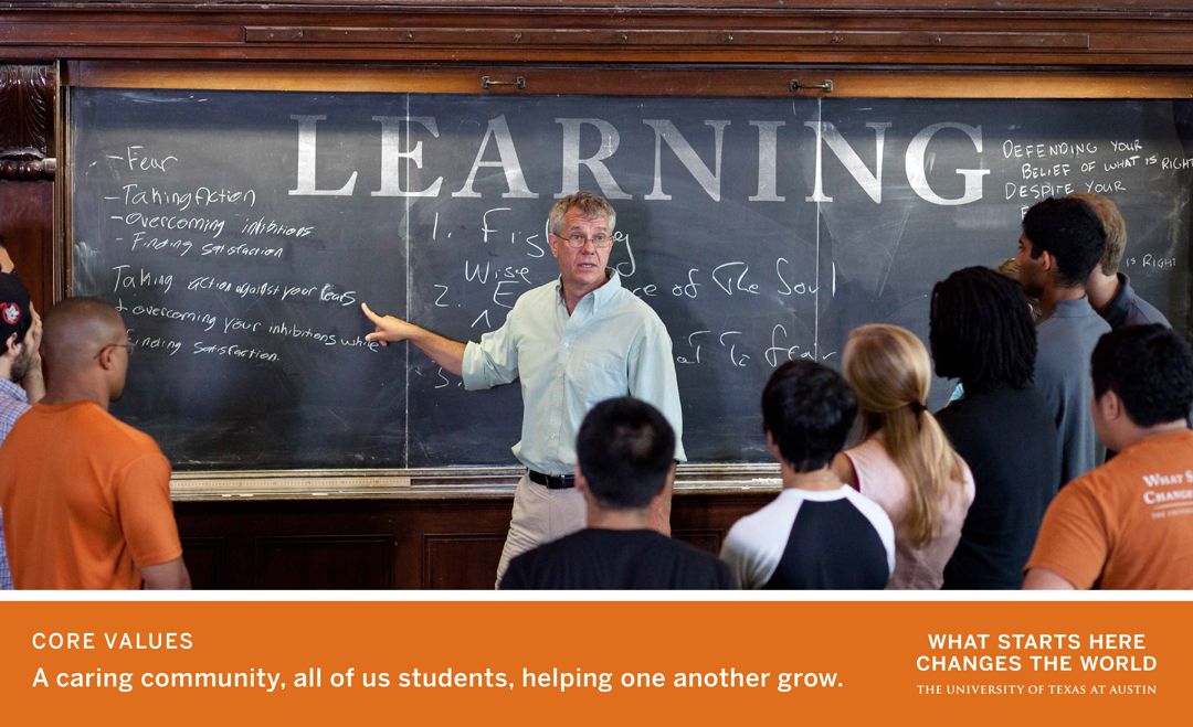Professor teaching diverse students in front of chalkboard reading “LEARNING”
