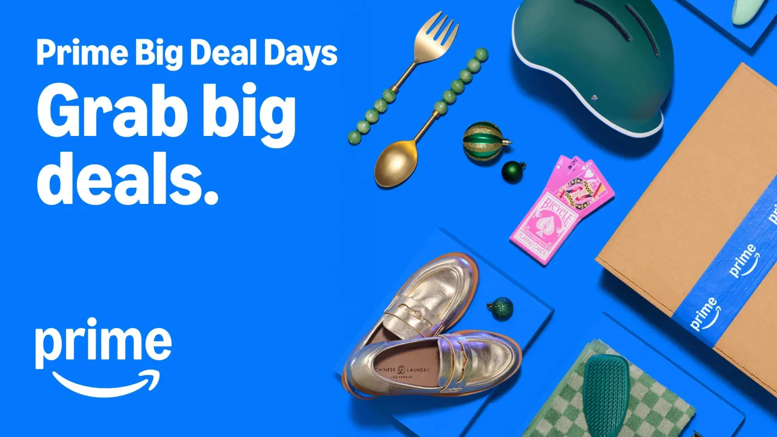 Amazon Prime Big Deal Days banner reading “Grab big deals,” featuring shoes, a helmet, tableware, playing cards, and a Prime delivery box.