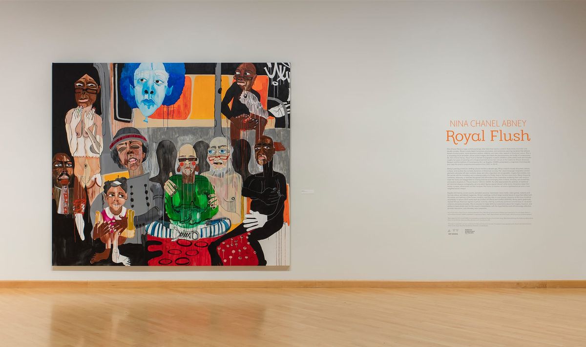 Installation view of large scale painting and wall text