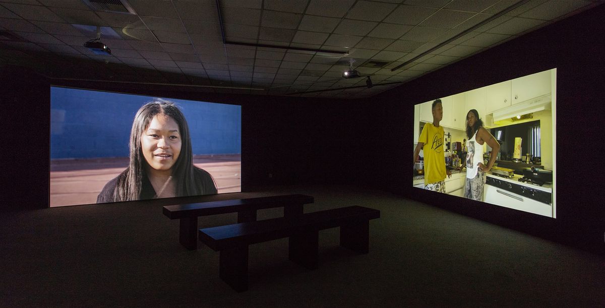 Installation view of two of the three large scale monitors
