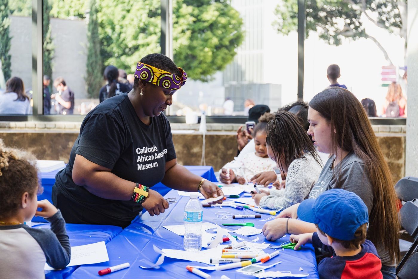 Students making crafts at the California African American Museum