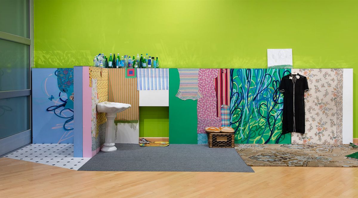 Vignette of makeshift home interior in greens, blues, yellows, and pinks