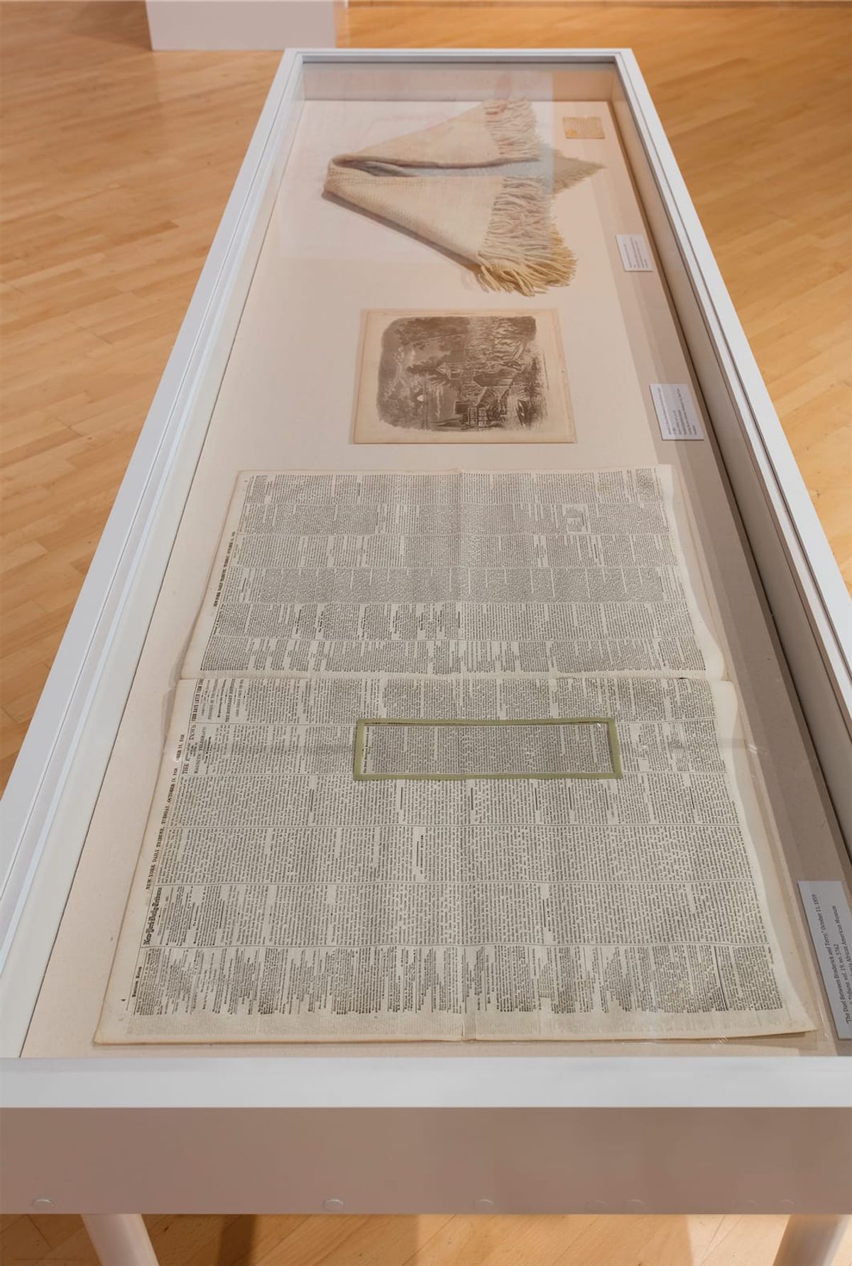 Newspaper from the time and supporting accessories