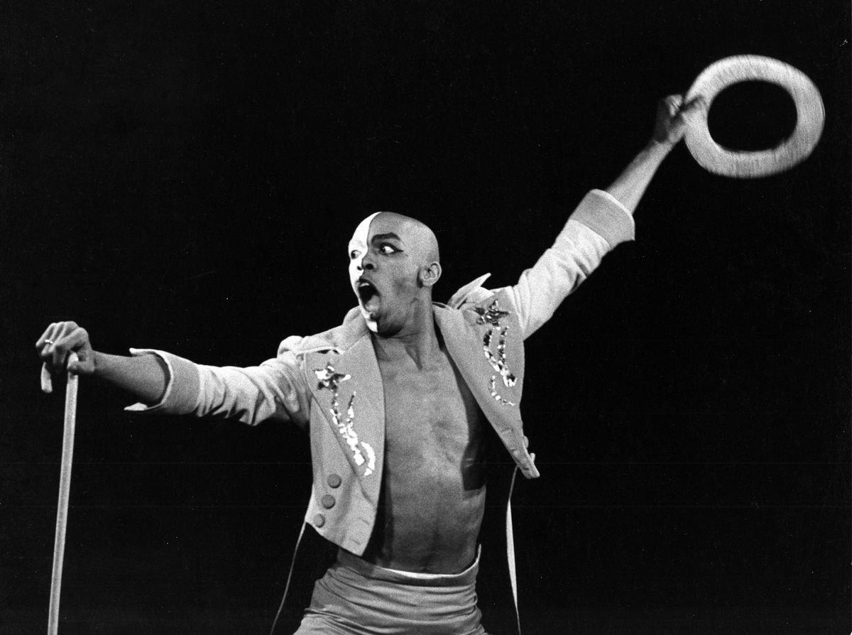 Geoffrey Holder during performance with hat and cane