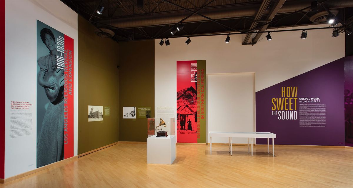 Installation view of large scale prints and wall text