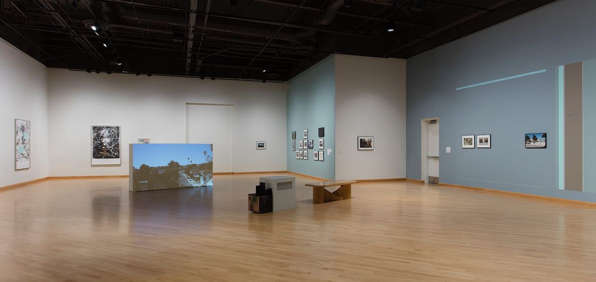 Far view of gallery space and artwork by Guerrier