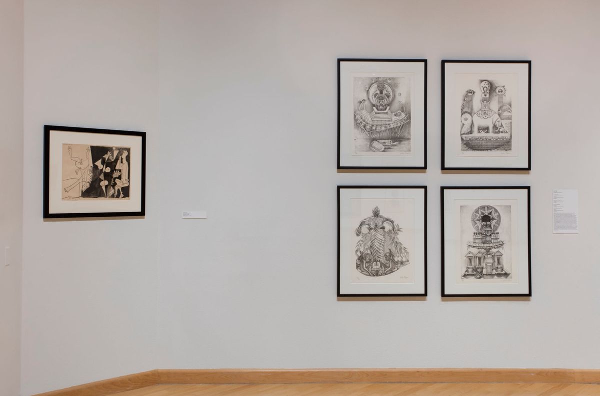 Installation view of framed artworks