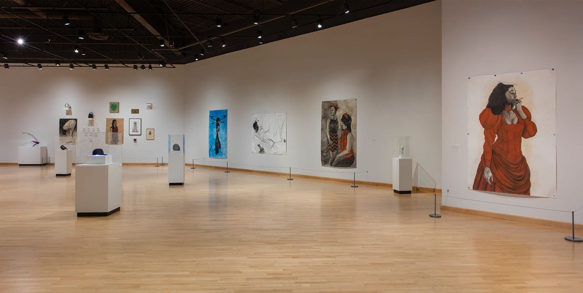 Installation view of multiple large scale paintings and vitrines
