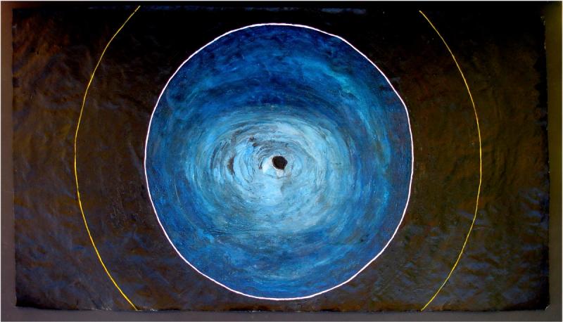 Gradients of light to blue-black in white circle inside ring of black inside line of yellow on black linen