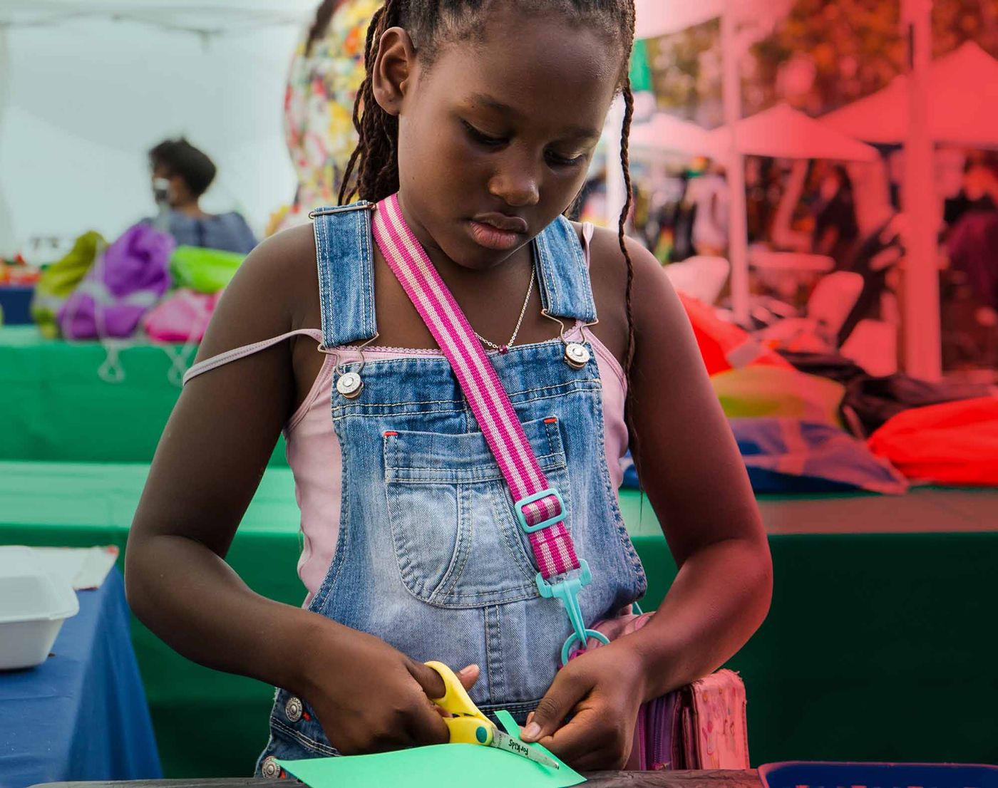 Child participating in an art workshop