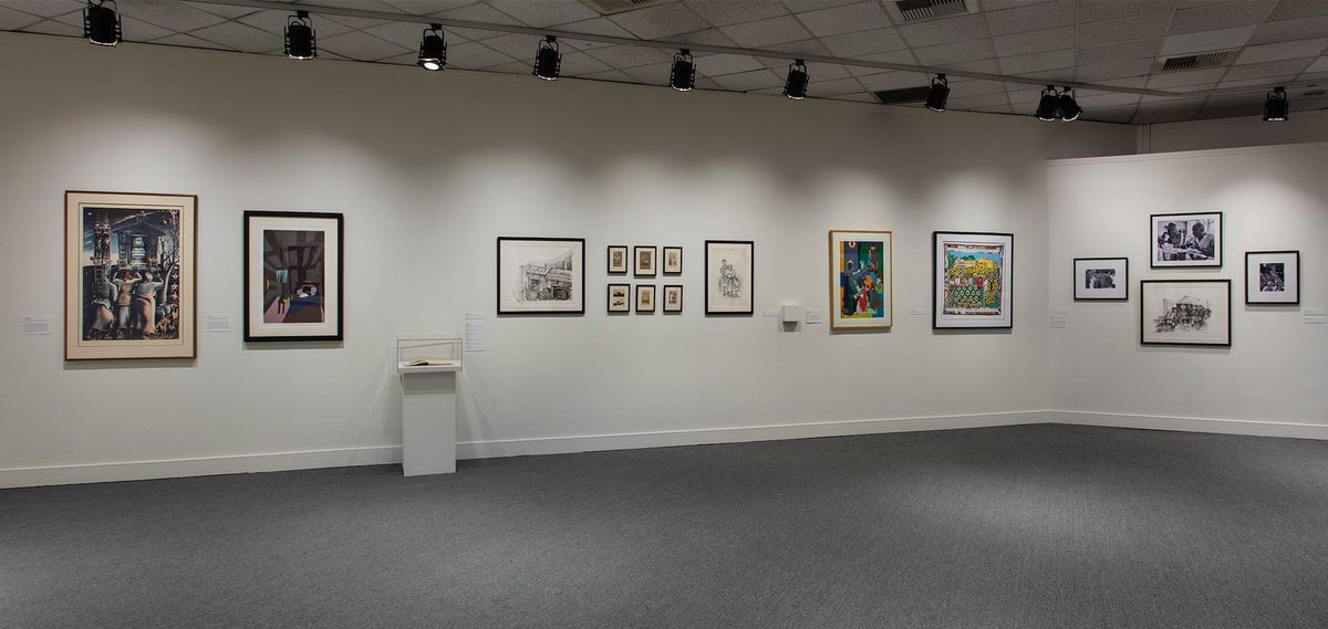 Installation view of framed artworks