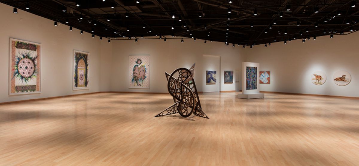 Installation view of large scale artworks and wood sculpture