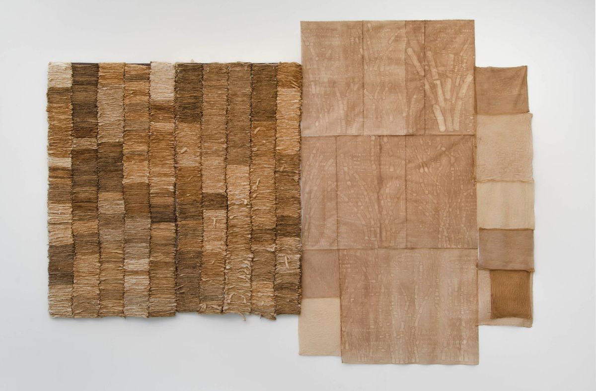 Two rectangles made of, burnt sugar, raw cotton balls, and cotton fabric, in  perpendicular overlap