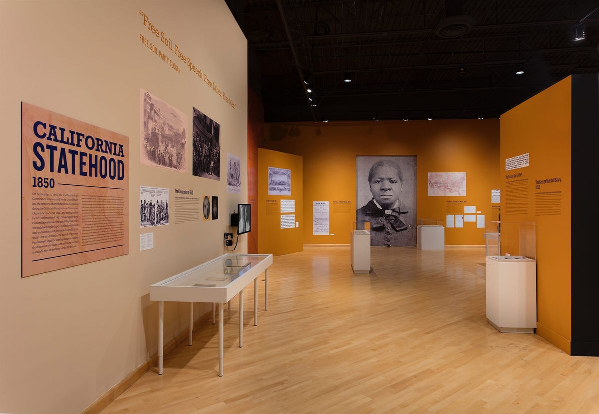 Installation view of California Statehood and Biddy Mason large scale images