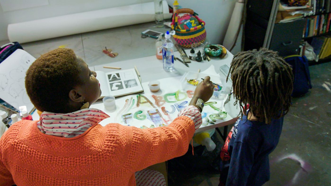 Student making crafts at the California African American Museum