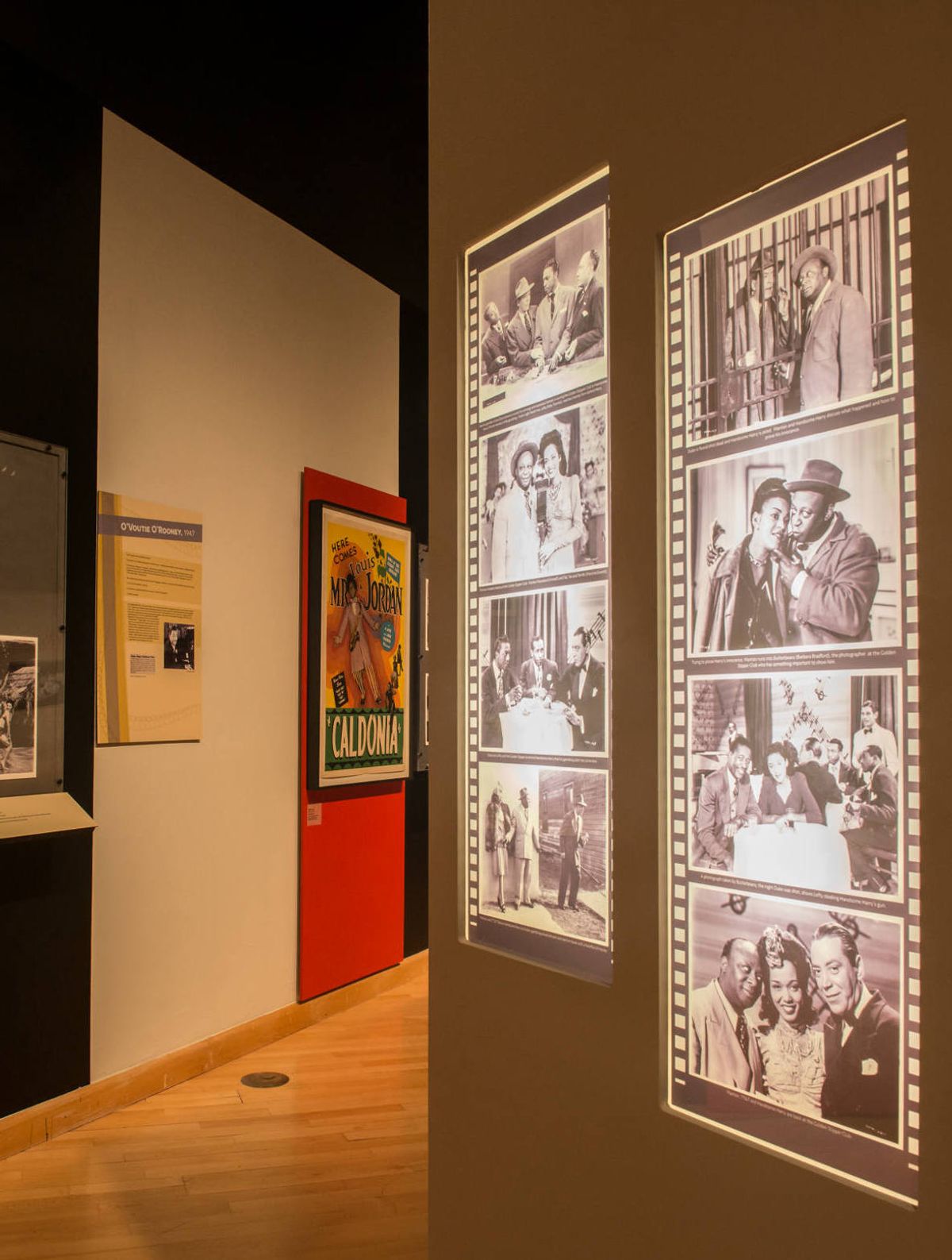 Installation view of projected film stills collage