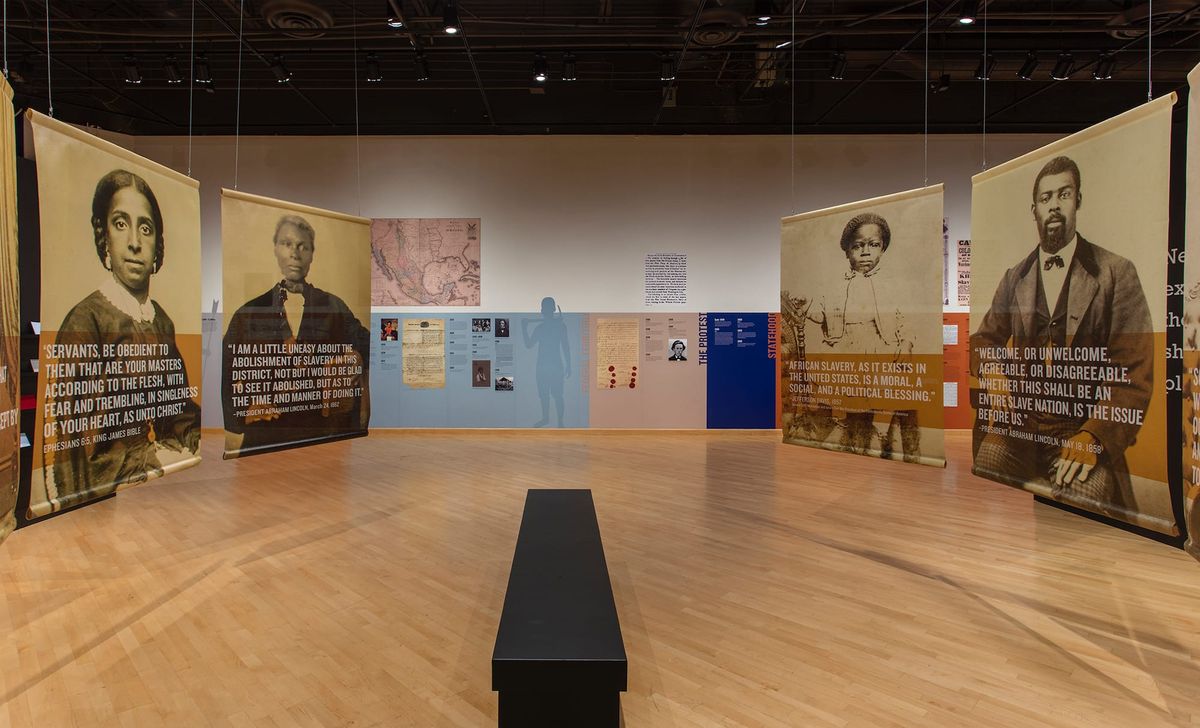 Installation view of large scale images of freedmen and freedwomen