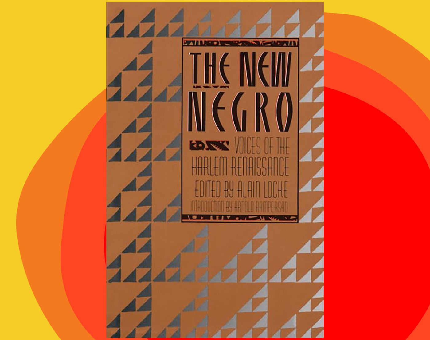Title art written in ethnic inspired font on a background of printed triangle patchwork