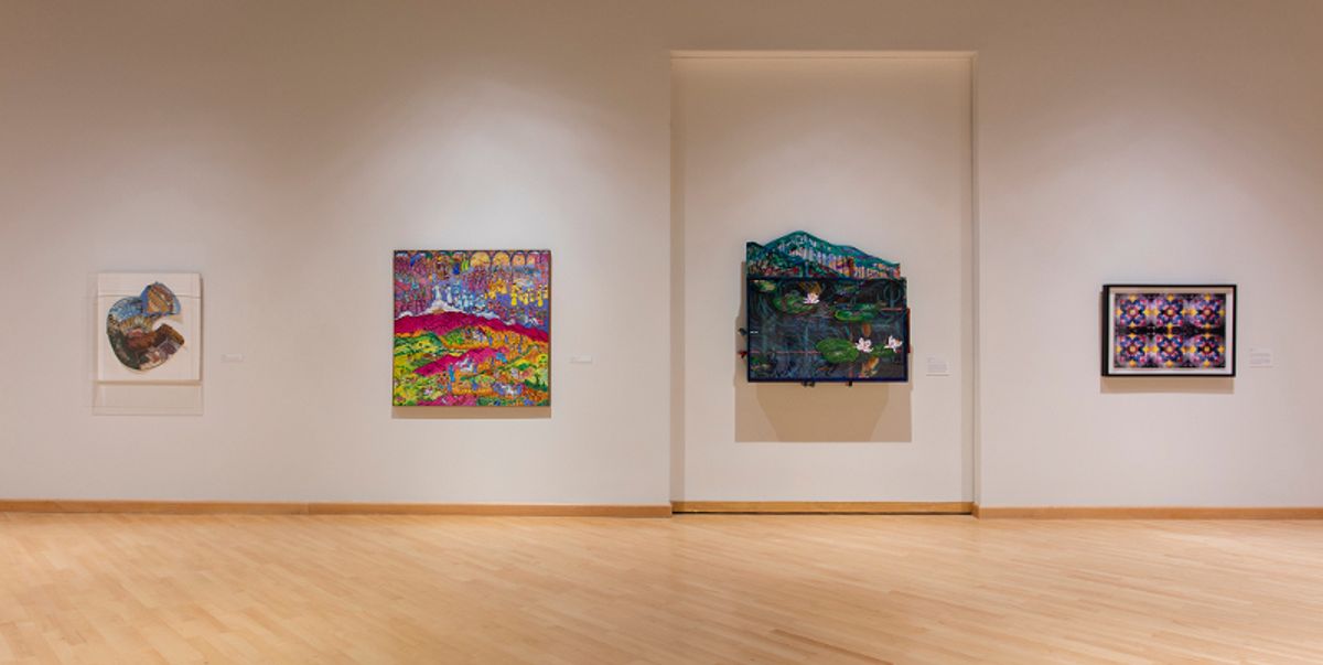 Installation view of paintings and mixed media 3D works