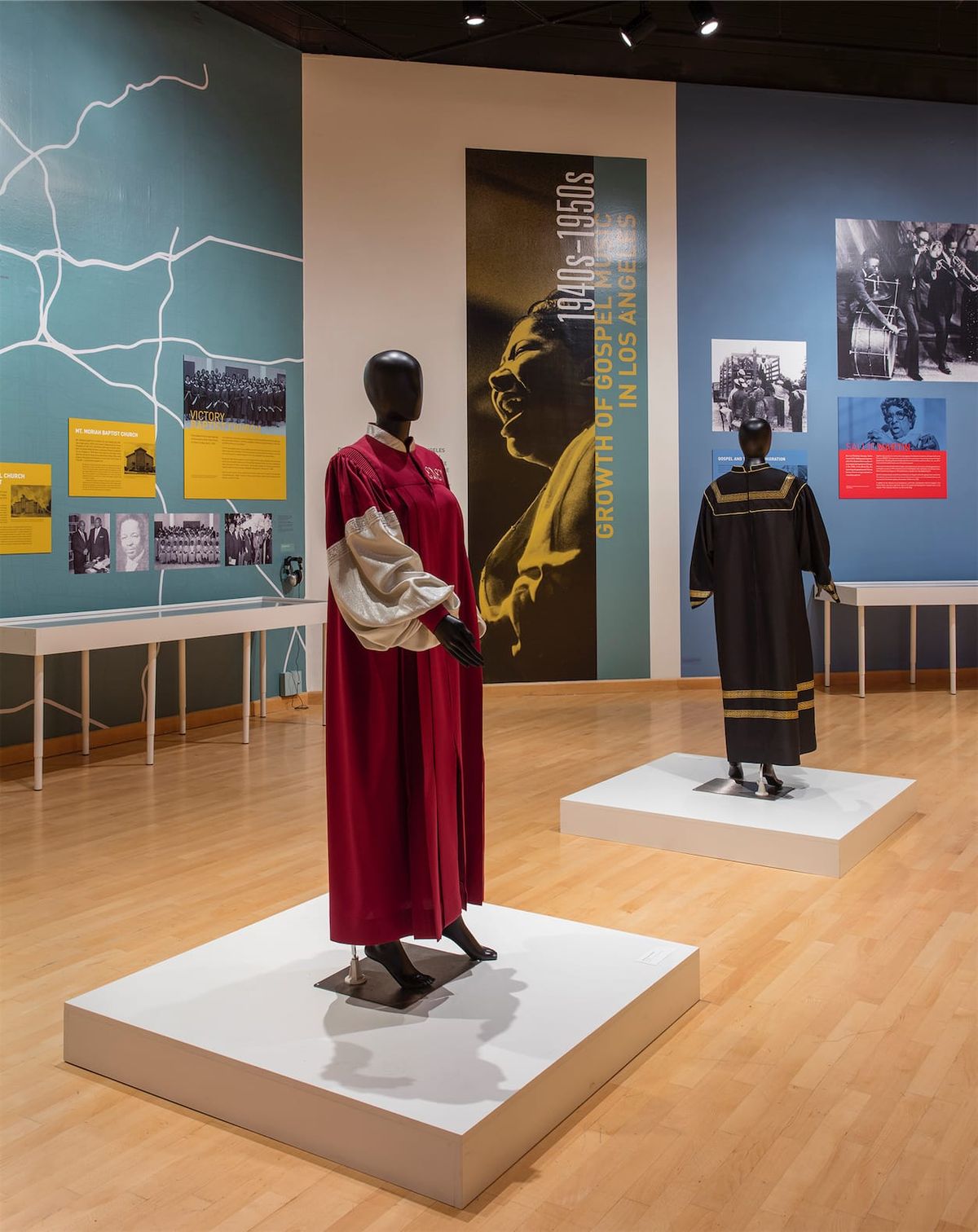 Installation view with focus on the choir robe displays