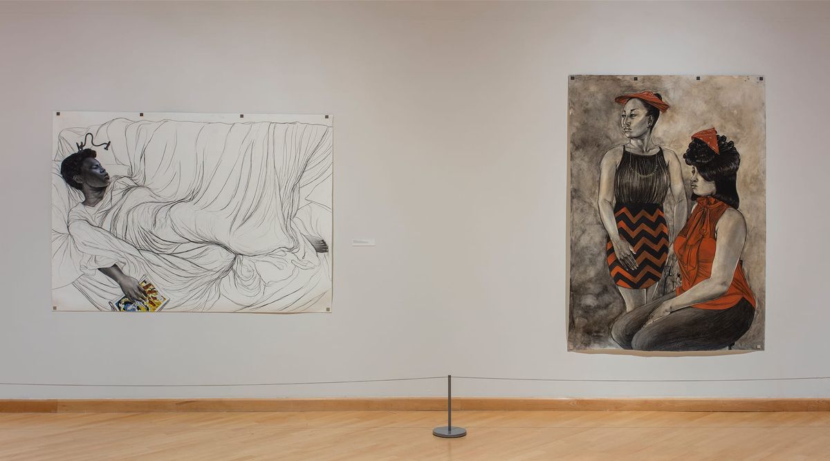 Installation view, two large paintings, three women