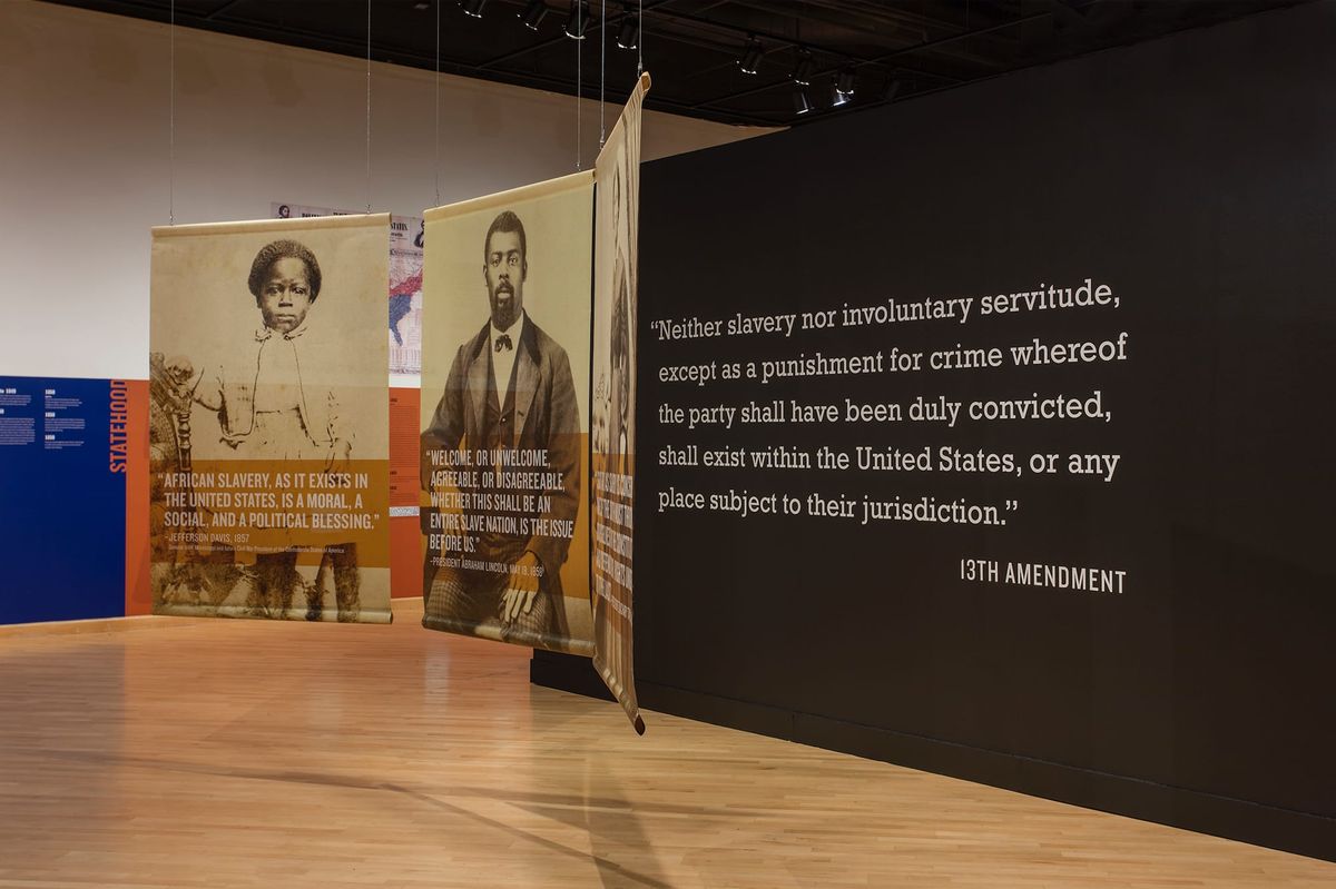 Installation view of 13th Amendment wall text