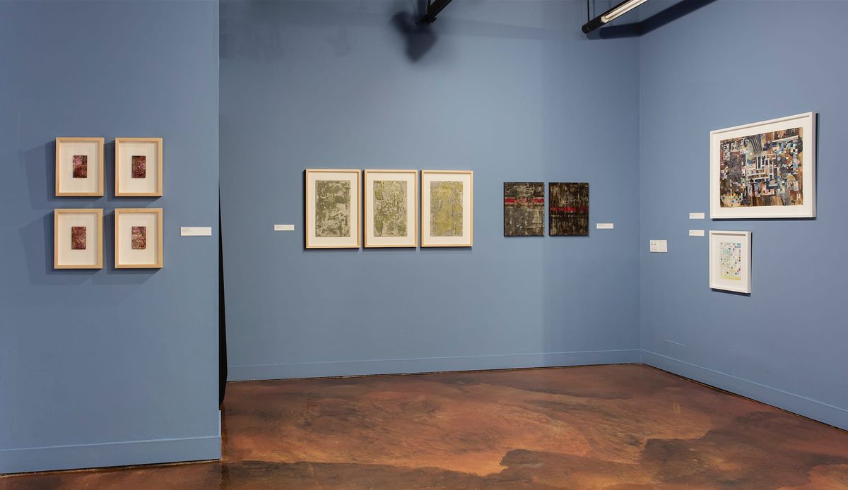 Exhibition view of multiple framed works
