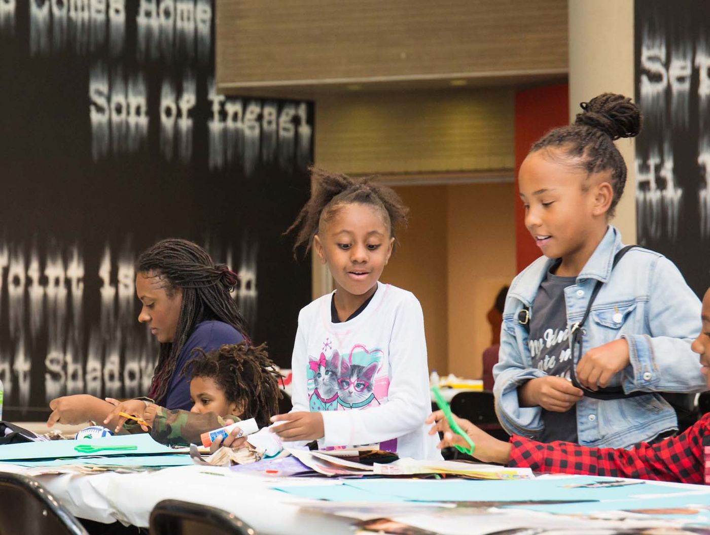Child participating in an art workshop