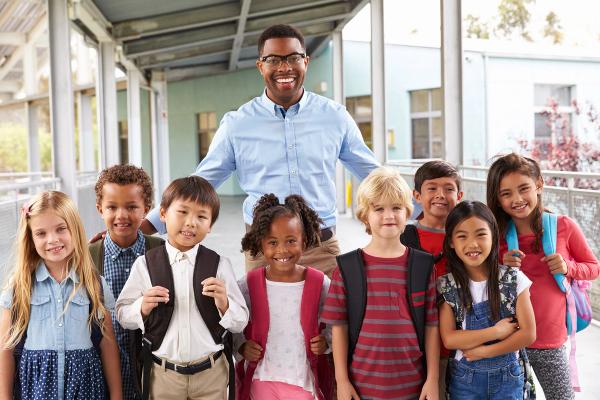 Group of little learners with their teacher