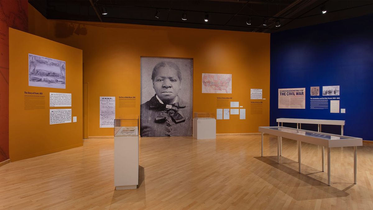 Installation view with large scale image of Biddy Mason