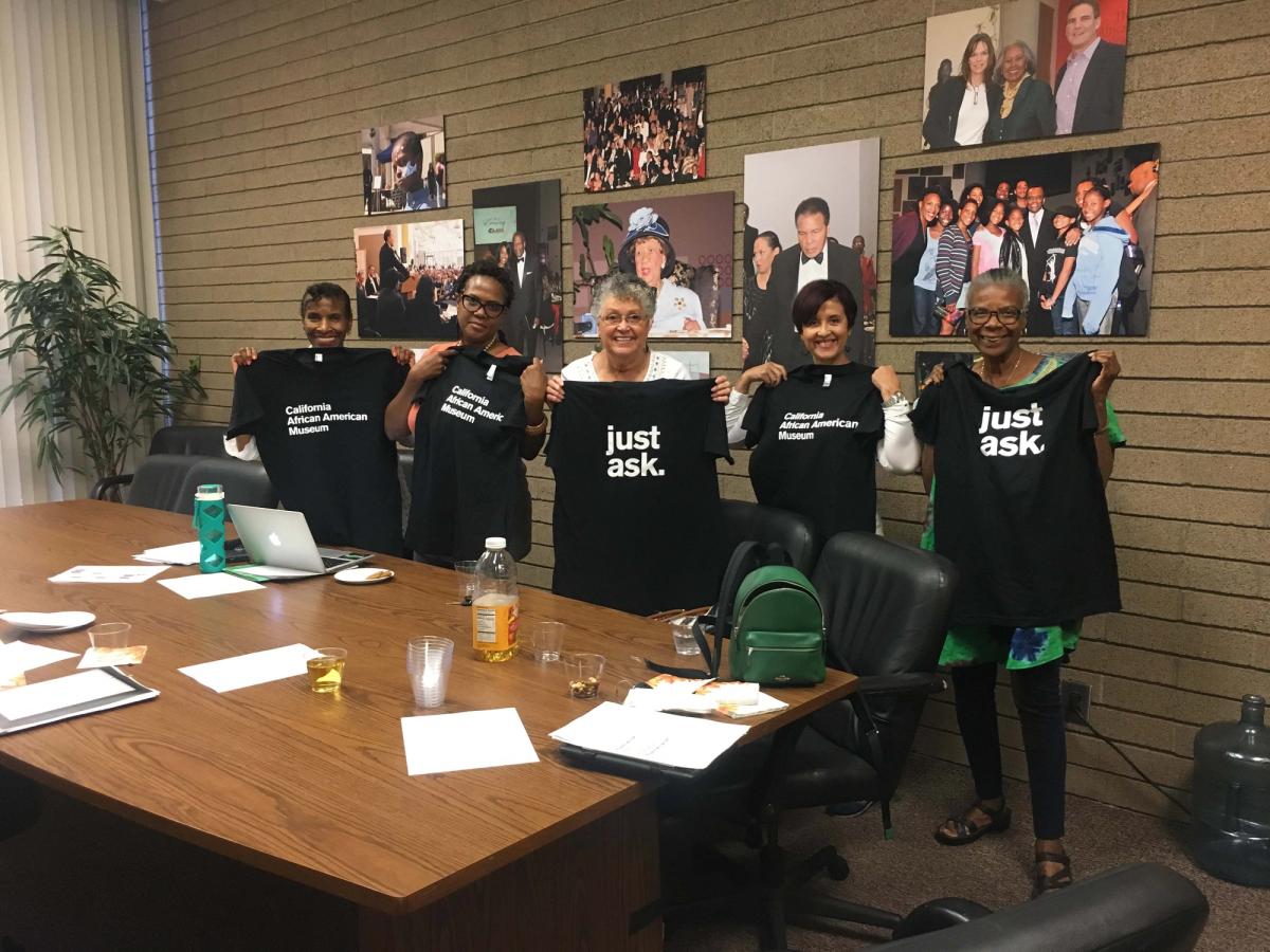 CAAM volunteers with their new tees