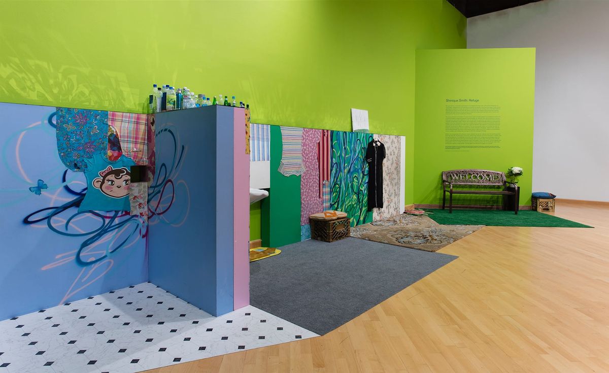 With green as a running theme through the installation this view includes green and blue  personal objects