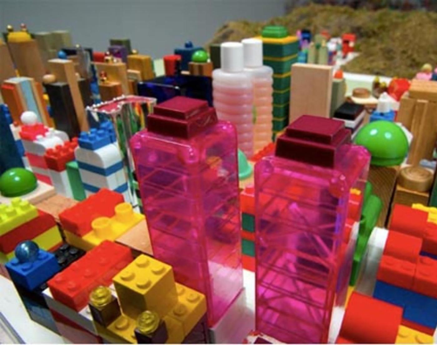 Detail of mixed media assemblage of colorful plastic objects
