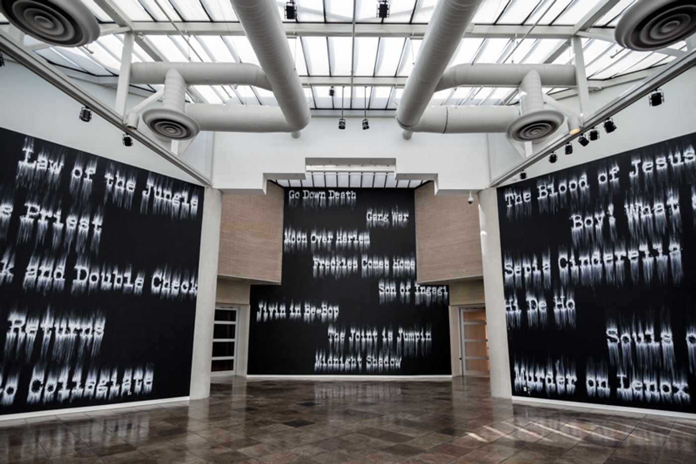 Installation view of large scale text art