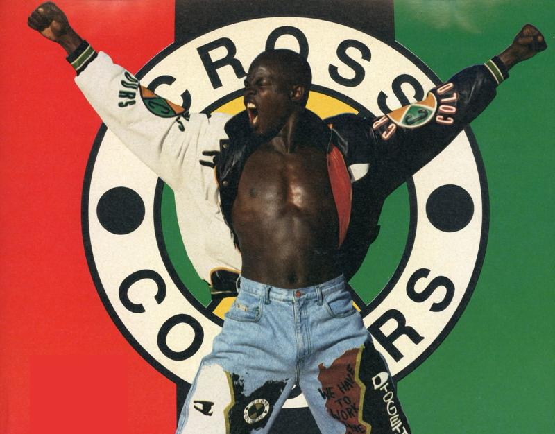 Cross Colours advertisement, Djimon Hounsou wearing black and white leather jacket and embellished jeans