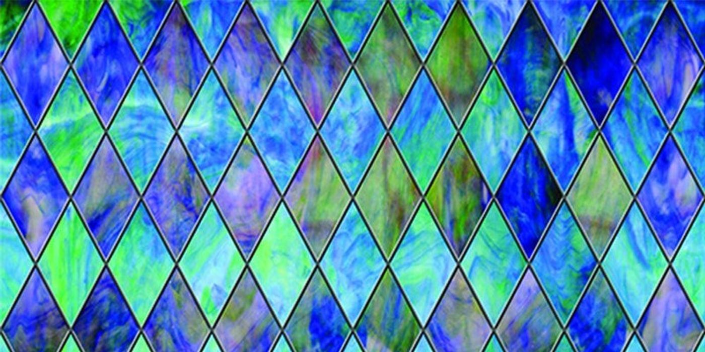 Panel of diamond cut pieces of stained glass in indigo blues and greens