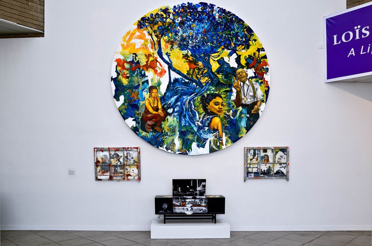 Installation view of collaged, decoupaged, and mural scaled artworks